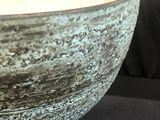 a bowl that is sitting on top of a table