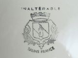 an image of a close up of a plate with a crown on it