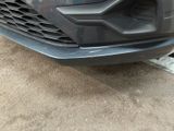 a close up of the front bumper of a car