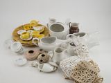 a white table with a lot of different items on it