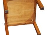 a small wooden box with a handle on a white background