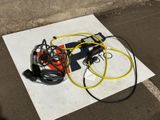 a yellow and black hose and a black and yellow hose on the ground