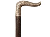a close up of a walking stick with a handle on a white background