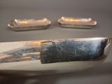 a knife that is sitting on top of a table