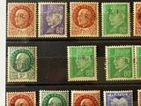 a picture of a collection of stamps on a table