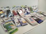 a lot of cell phones that are sitting on a table