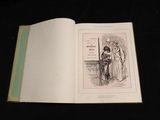 an open book with a picture of a man and a woman