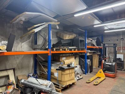a large room with a lot of items on the shelves