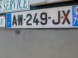 a sign on the back of a truck that says bus service