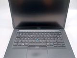 a laptop that is sitting on a white table