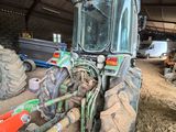 a tractor that is parked inside of a building