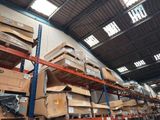 many boxes on the shelves in the warehouse