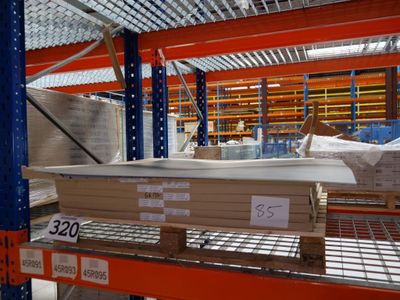 a lot of boxes on the shelves in the warehouse
