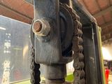 a close up of a chain attached to a fire hydrant