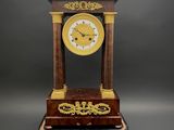 a clock that is sitting on top of a table