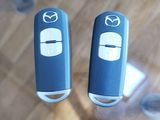 two remote controls that are sitting on a table