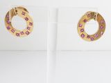 an image of a pair of earrings with pink stones on them