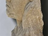an image of a stone statue of a woman ' s head on a white surface