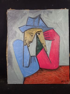 un tableau représentant un homme avec un chapeau posé sur une table