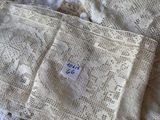 a close up of a piece of cloth with a tag on it