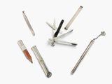 several different types of tools are arranged in a circle on a white surface