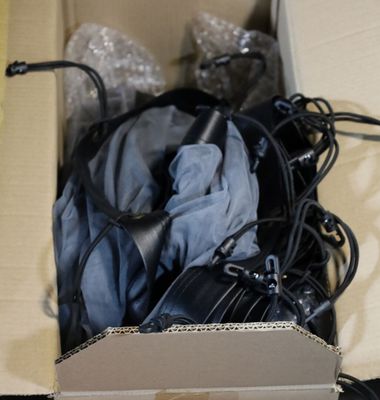 a box with a bunch of clothes inside of it