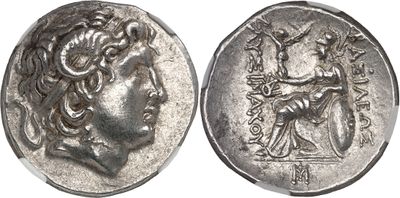a silver coin with an image of a woman on it