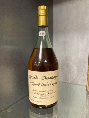 a bottle of wine that is sitting on a table