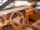 a dashboard and steering wheel of a car in a car showroom