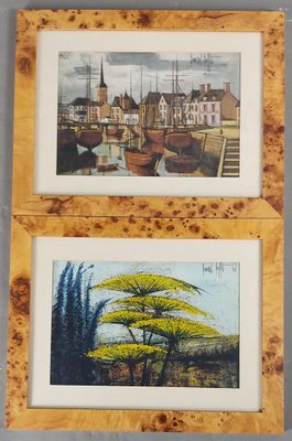deux tableaux encadrés représentant une ville et un arbre, dans un cadre en bois