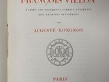 an open book with a picture of a clock on the cover
