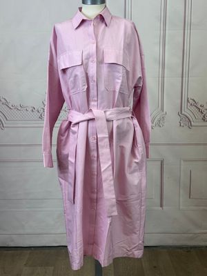 the pink shirt dress is on a mannequin mannequin mannequin mannequin mannequin mannequin mannequin mannequin mann