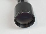 a close up view of a telescope lens on a white surface