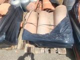 many pots and pans sitting on a pallet