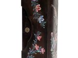 a black case with flowers on it on a white background