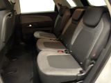 the back seats of a car are empty with no one in it
