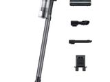 a vacuum cleaner with a cord attached to it ' s head