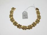 a close up of a bracelet with a price tag on it