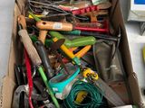 a box full of tools sitting on the floor