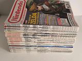 a stack of magazines sitting on top of a table