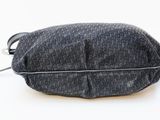 a bag that is sitting on a white surface