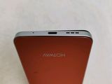 an image of a close up of the back of a red cell phone
