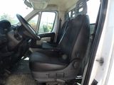 a picture of the inside of a van with the driver ' s seat up