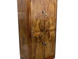 an image of a wooden cabinet with two doors and a drawer