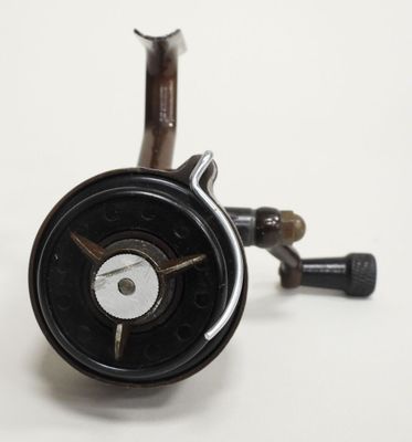a close up of a black and white spinning machine