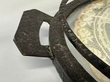 a close up of a metal object on a table