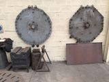 two large metal pieces on the side of a building