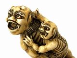 a figurine of a man holding a cat