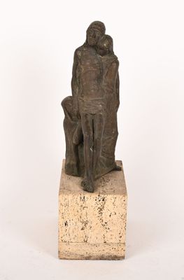 statue représentant un homme et une femme assis sur un bloc de pierre