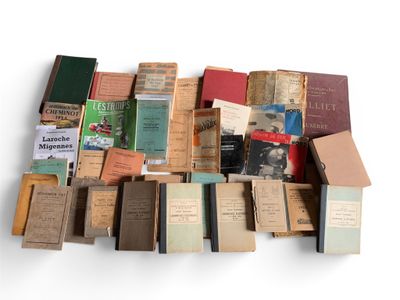 many old books stacked on top of each other